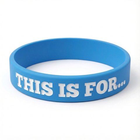 A blue This Is For silicone wristband created as a physical reminder of the person, purpose or reason that matters to you.
